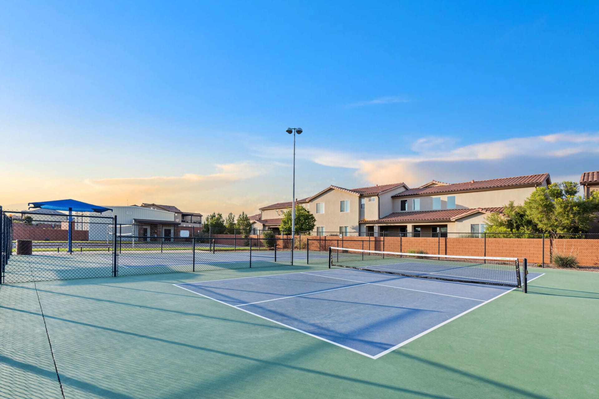 Tennis and pickleball courts at Paradise Village resort near Sunshine Suites