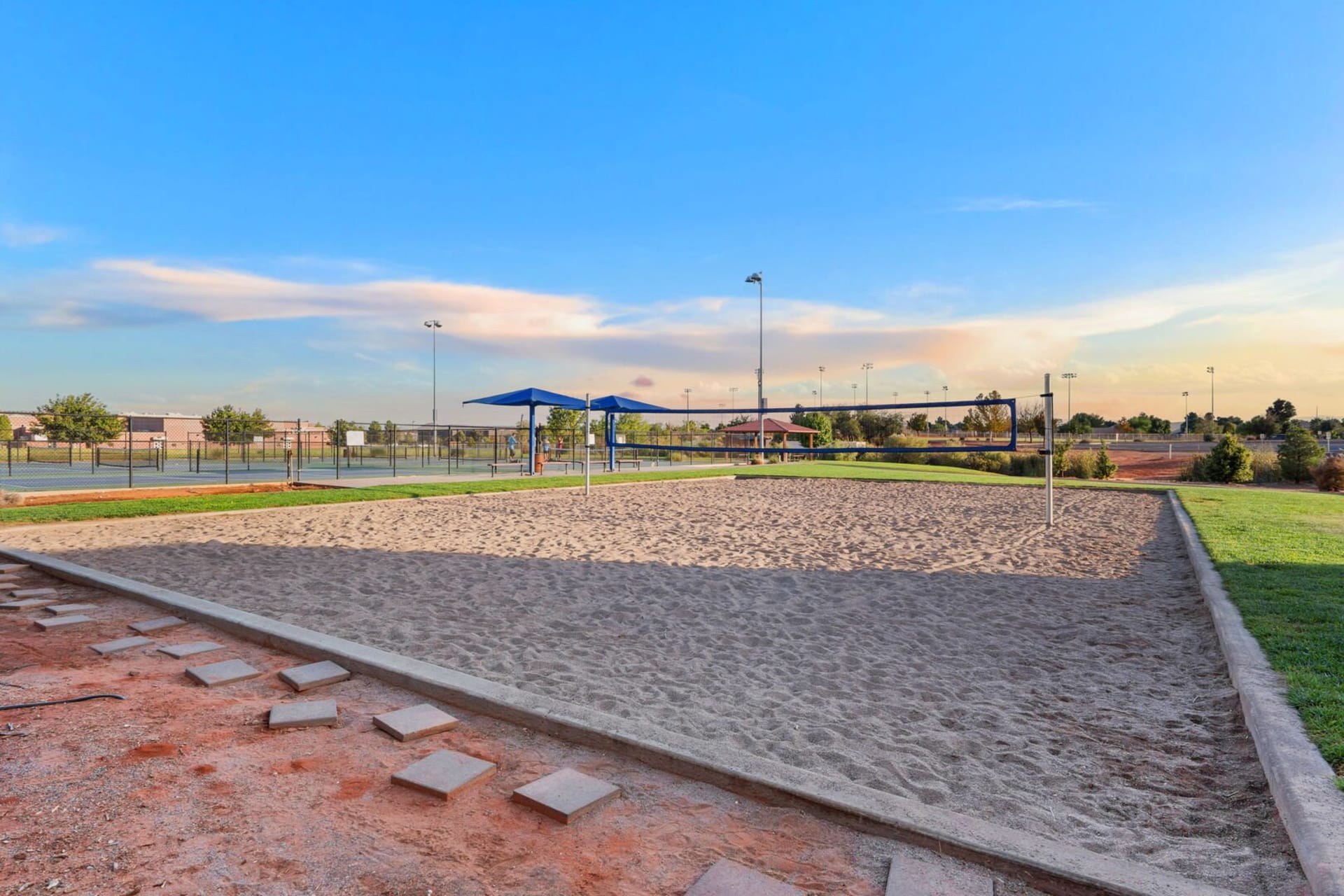 Sand volleyball court at Paradise Village resort near Sunshine Suites